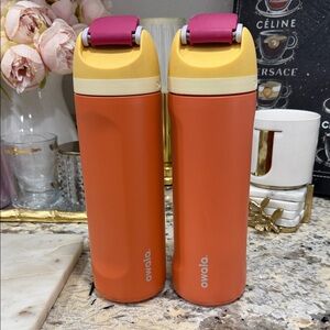 set 2 Owala Orange and Yellow Water Bottles